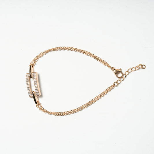 Rose gold bracelet with a chain design on a white background. Harma 18k Gold plated Lustre Bond Link Bracelet