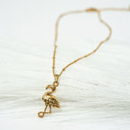 The Gentle Return Golden Flamingo Necklace - HARMA