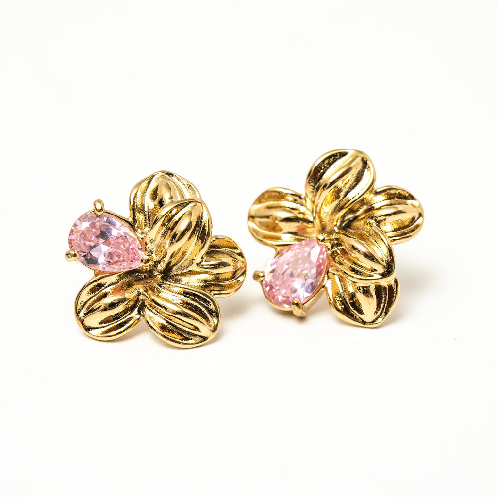 Gold earrings with pink gemstones on a white background. Harma gold plated Bloom Again Gold Earrings