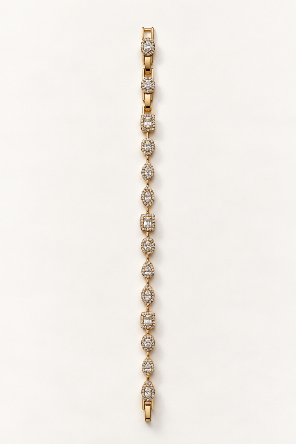 A delicate yellow gold tennis bracelet featuring pavé-set round and marquise-cut diamonds, arranged in a vertical line against a clean, off-white background. Fall Constellation Zirconia Bracelet 18k gold plated Harma jewelry