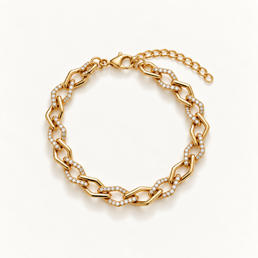 A gold chain link bracelet with pavé-set clear stones, displayed on a clean white background. Gilded Spark Gold Zirconia Link Bracelet | Harma Jewelry 18k gold plated