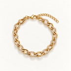 A gold chain link bracelet with pavé-set clear stones, displayed on a clean white background. Gilded Spark Gold Zirconia Link Bracelet | Harma Jewelry 18k gold plated