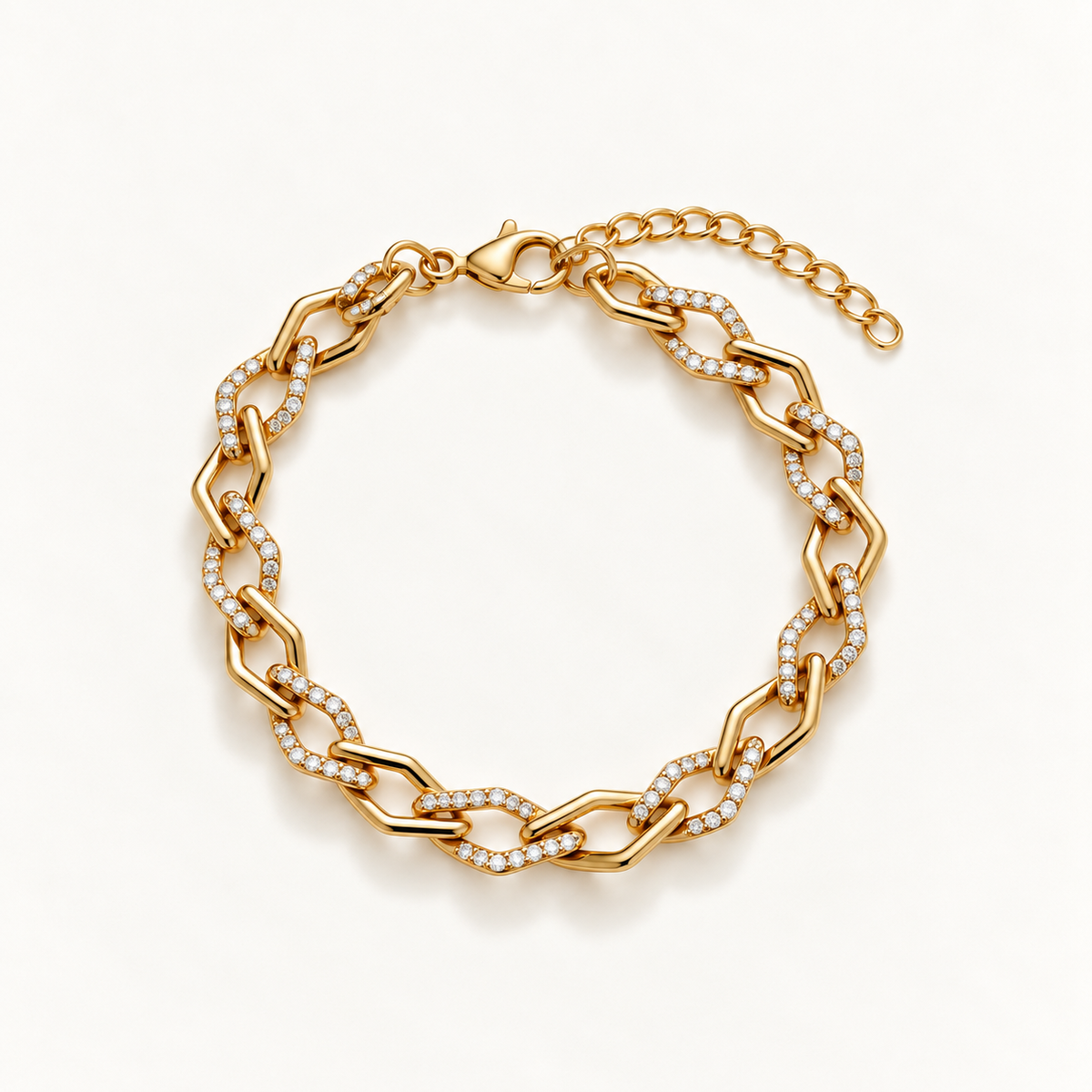 A gold chain link bracelet with pavé-set clear stones, displayed on a clean white background. Gilded Spark Gold Zirconia Link Bracelet | Harma Jewelry 18k gold plated