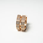 Rose gold hoop earrings with diamond accents on a white background Harma Horizon Edge Zirconia Hoop Earrings