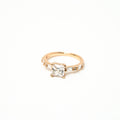 White princess cut stone with cubic zirconia around the ring in baguette cut with white background. solitair ring 