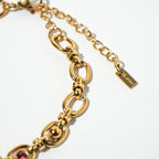 Gold bracelet with heart-shaped charms on a white background. Harma Jewelry Gold plated Unbreakable Link Pink Zirconia Bracelet