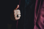 Hand wearing a ring on a dark  background Harma Jewelry Men Tungsten Carbide Band Ring Black Barrel Simple 