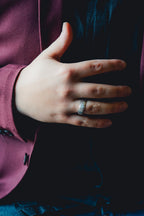 Hand wearing a ring with a dark background Harma Jewelry Men Tungsten Carbide Band Ring Silver Simple 