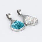 Harma jewelry platinum plated white gold teardrop necklace in three colors blue burgundy and white stones. Harma jewelry Droplets of Mercy Platinum Plated Teardrop Necklace Blue White Stones. 