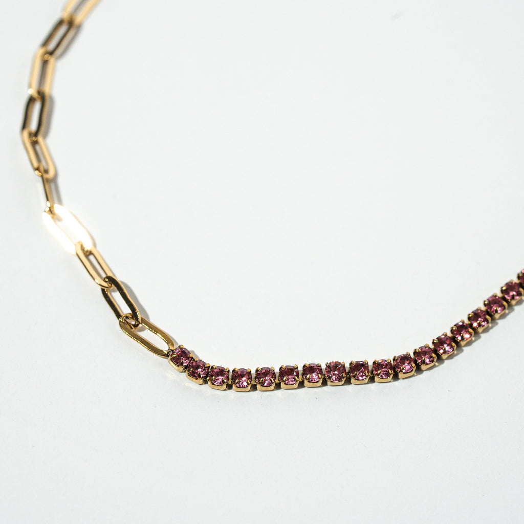 Gold chain necklace with red gemstones on a white background Harma jewelry gold plated I Am Becoming PINK Link Bracelet
