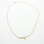 Gold necklace on a white background. Harma jewelry s925 I Am Guided Sparkle Sterling Silver Zirconia Necklace