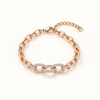 A rose gold chain bracelet with a central pavé diamond link accent, displayed on a clean white background. Élan Pavé Link Zirconia Bracelet 18k gold plated harma jewelry